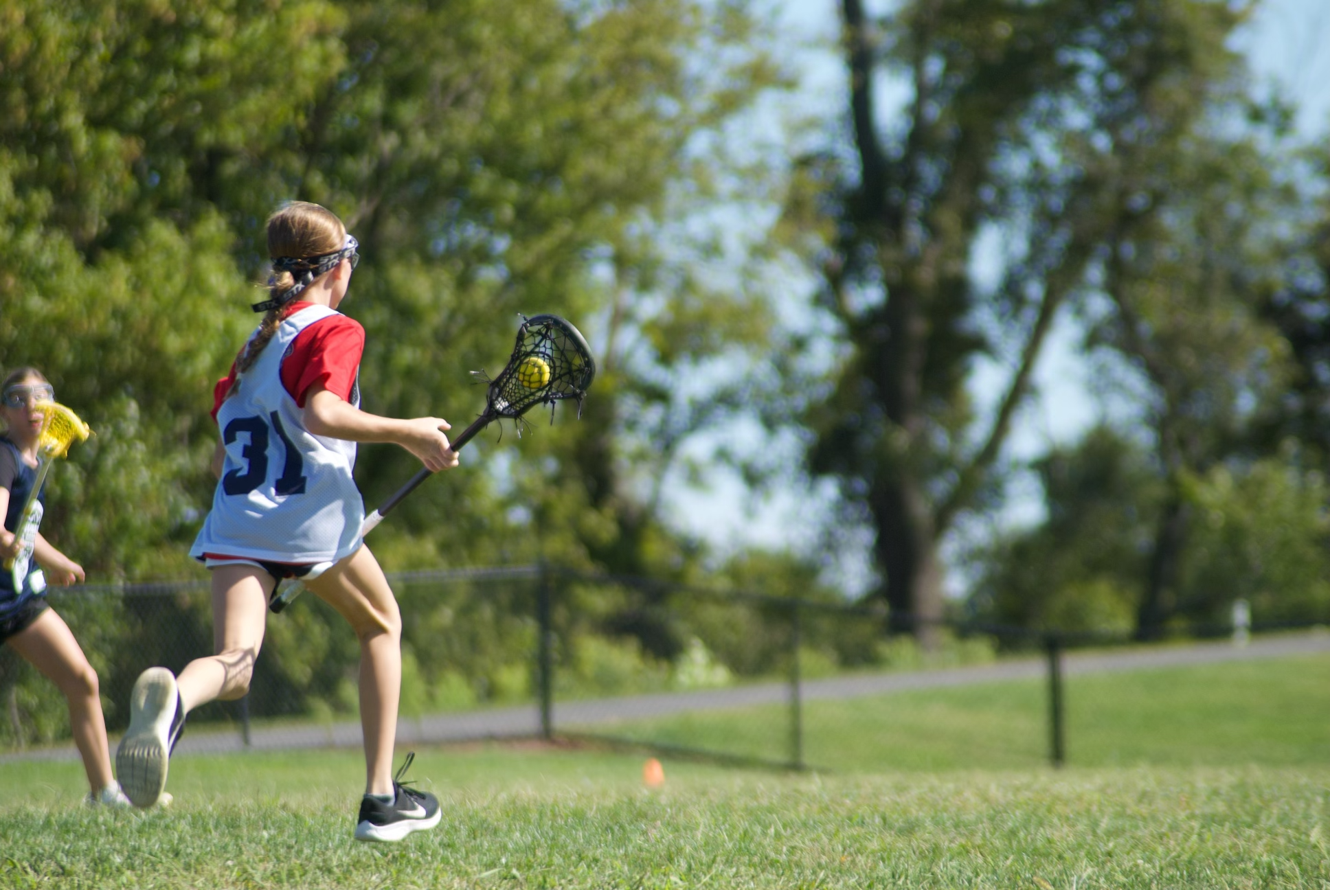 Krakens girls lacrosse action